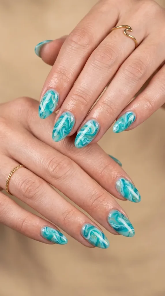 aqua marble water-effect nails