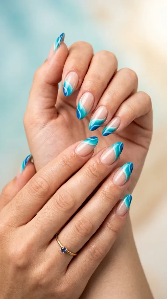 Aqua wave tip almond nails