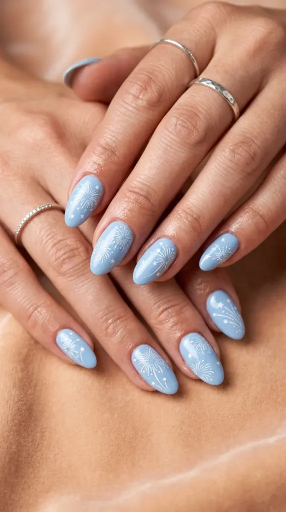 Baby blue nails with white fireworks stamping