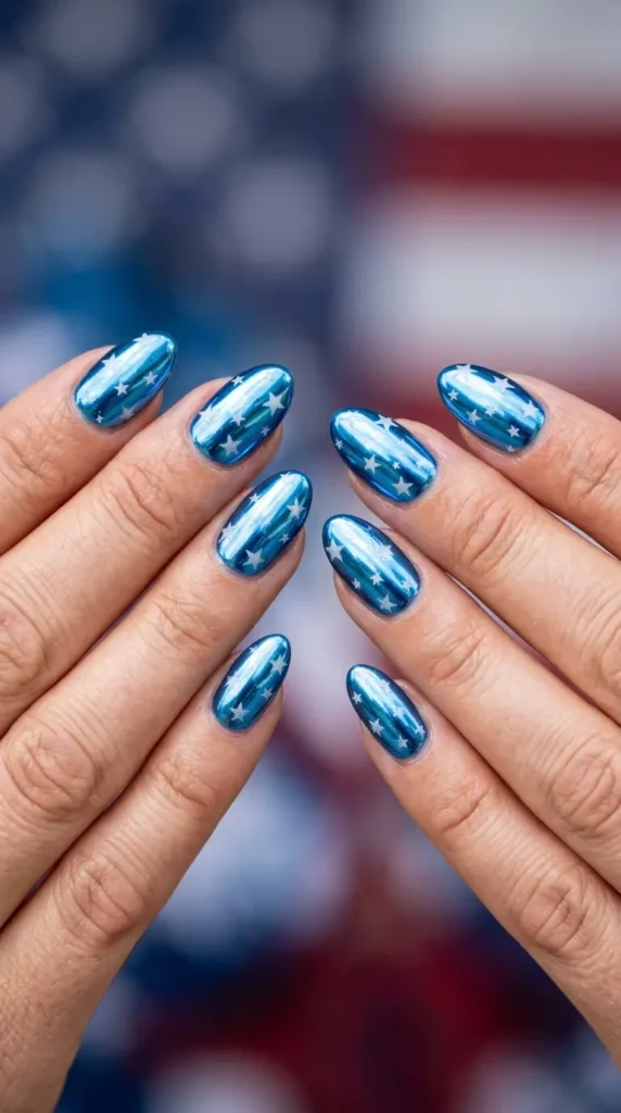 Blue chrome nails with subtle star stamping