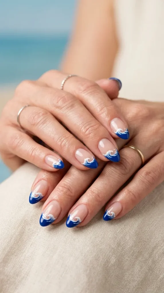 Blue French tips with wave detailing