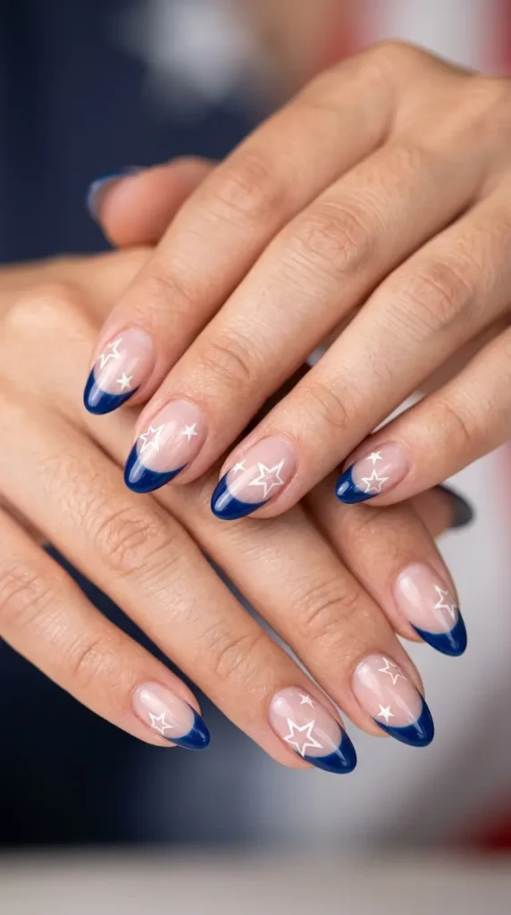 Blue French tips with white star outline accents