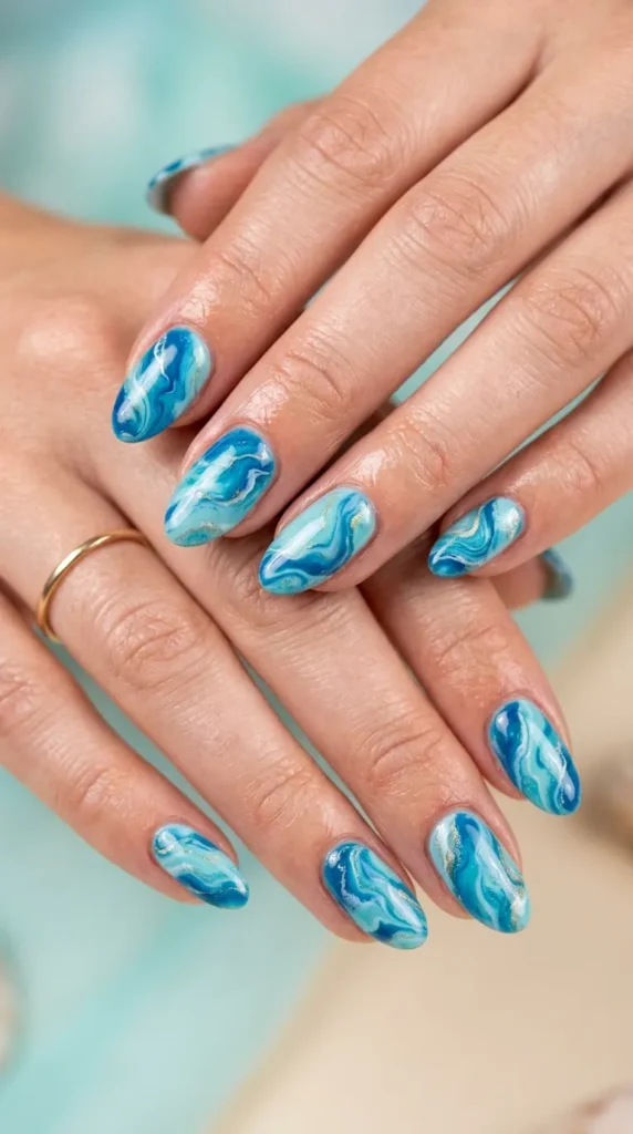 Blue lagoon marble nails