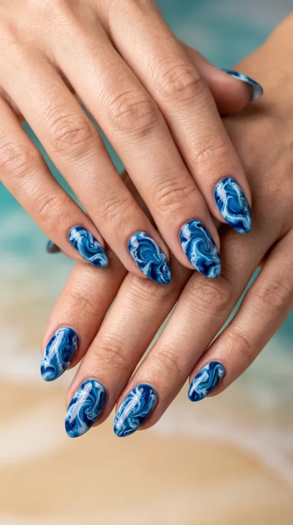 Blue lagoon swirl marble nails