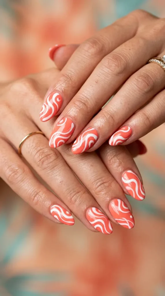 Coral and White Swirl Nails