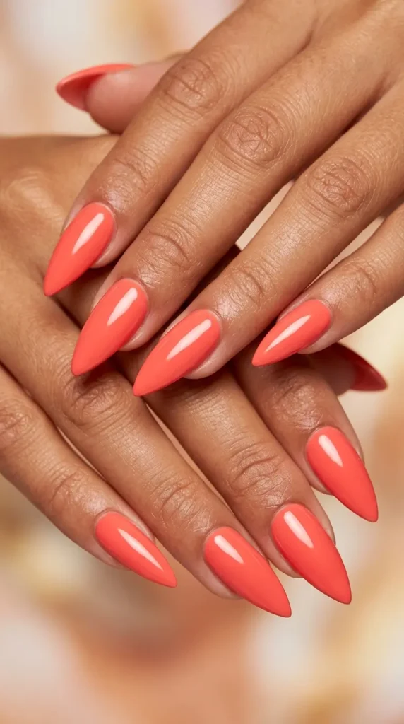 Coral stiletto bold nails
