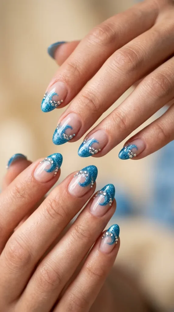 Glittery ocean wave tips with rhinestones