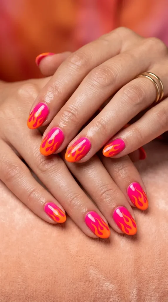 Hot pink + orange flame tropical nails