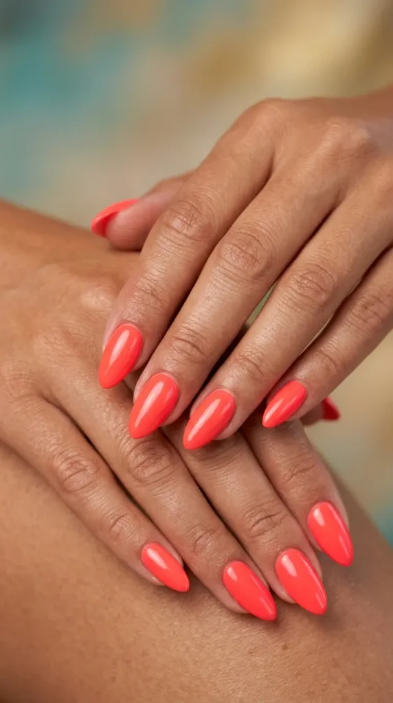 Neon coral almond nails