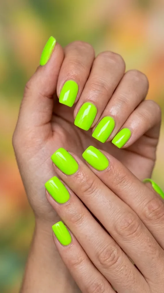 Neon green lime pop nails with glossy topcoat