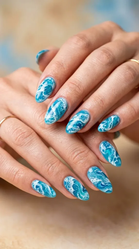 Ocean foam wave swirl nails (blue + white)