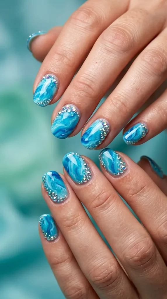 Turquoise crystal ocean nails with gem accents