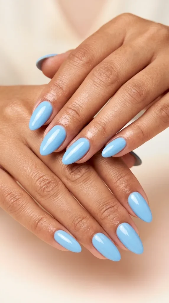 Baby blue almond nails with glossy finish