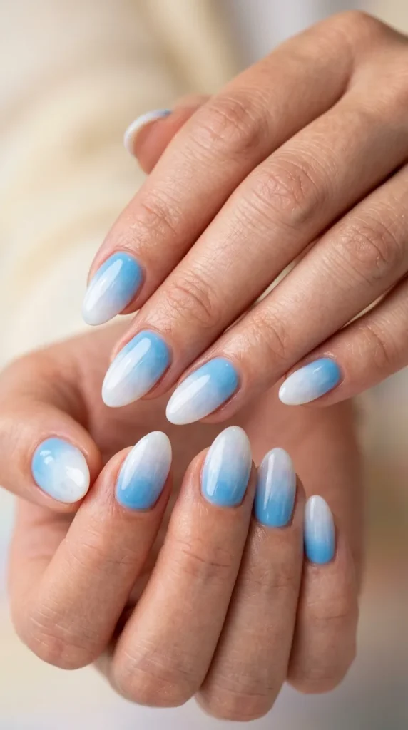 Baby blue to white cloud ombre nails