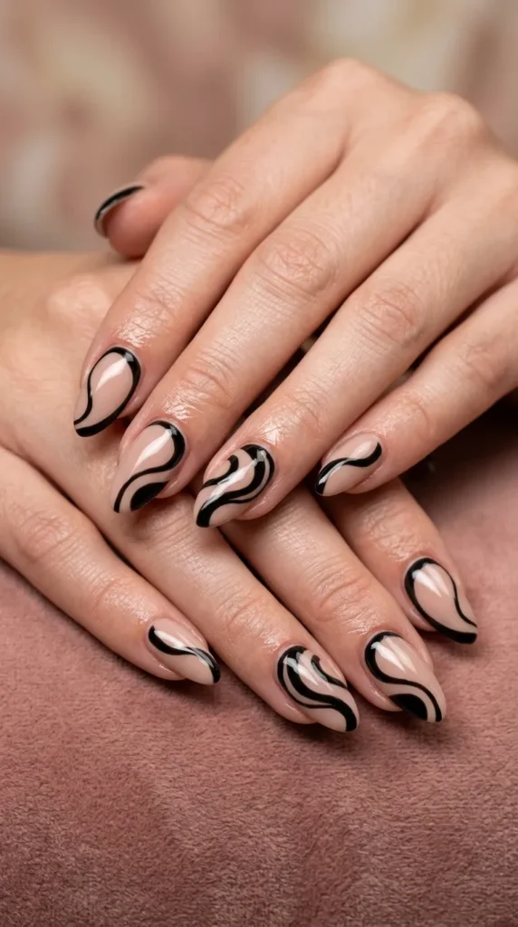 Black nude swirl contrast nails