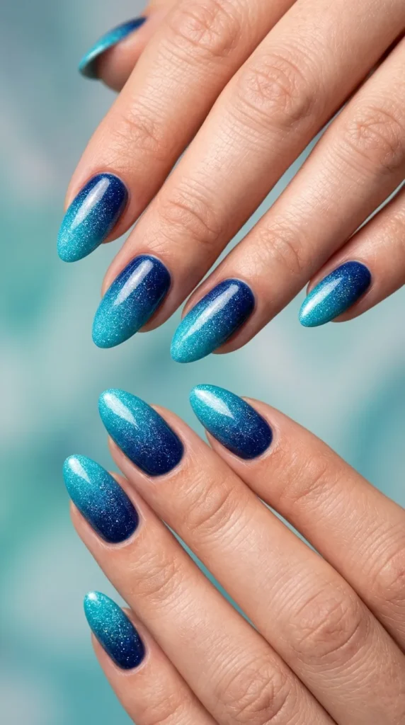 Blue ocean gradient almond nails with shimmer