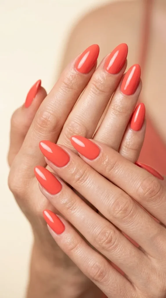 Coral glossy almond nails