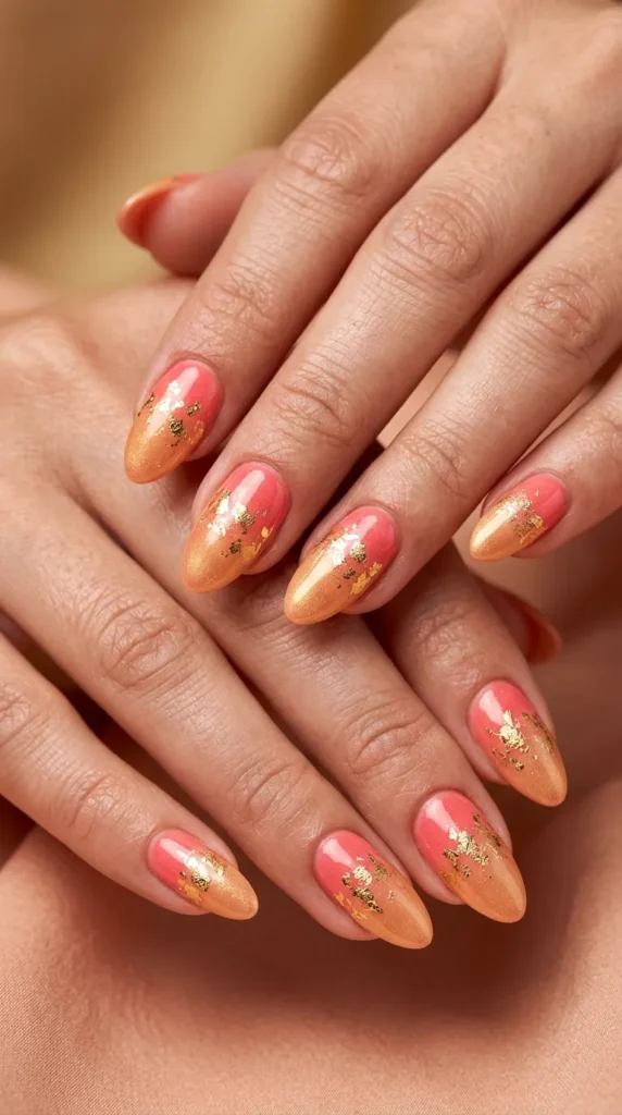 Coral pink to gold foil ombre nails