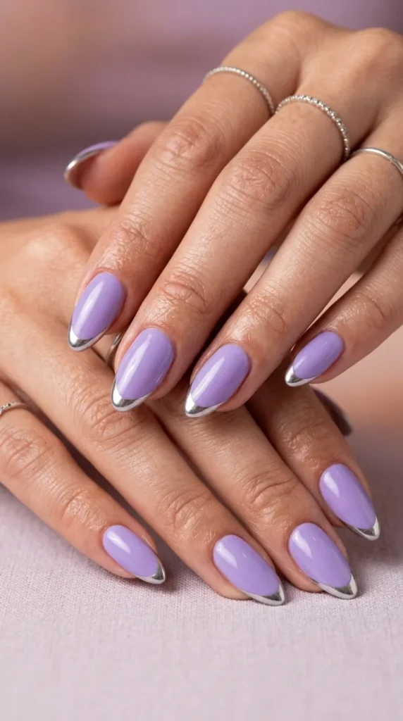 Lavender almond nails with silver chrome tips