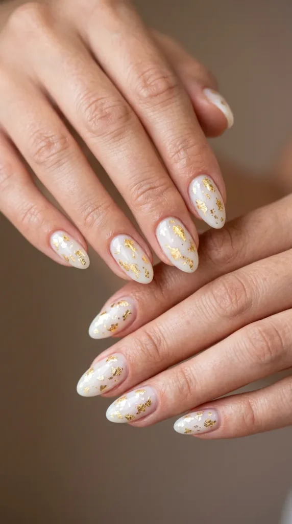 Milky white base with gold foil flakes scattered