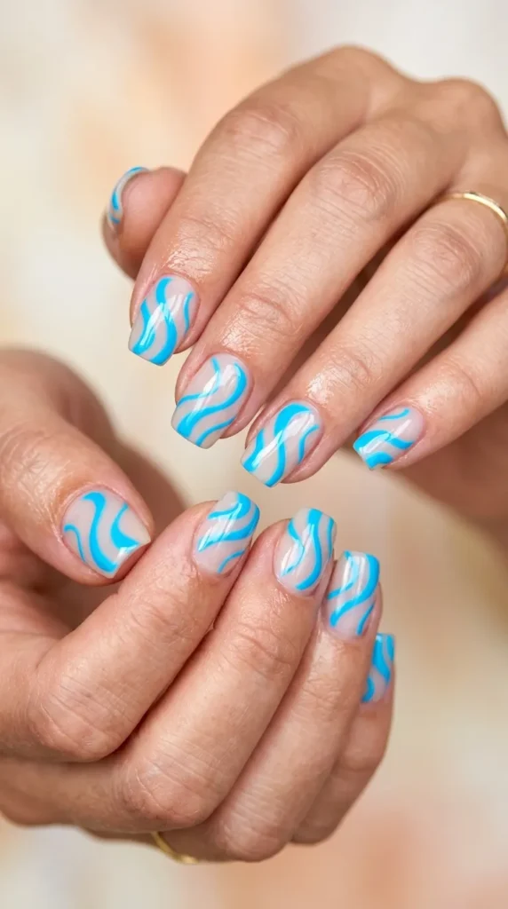 Neon Blue Swirl Nails