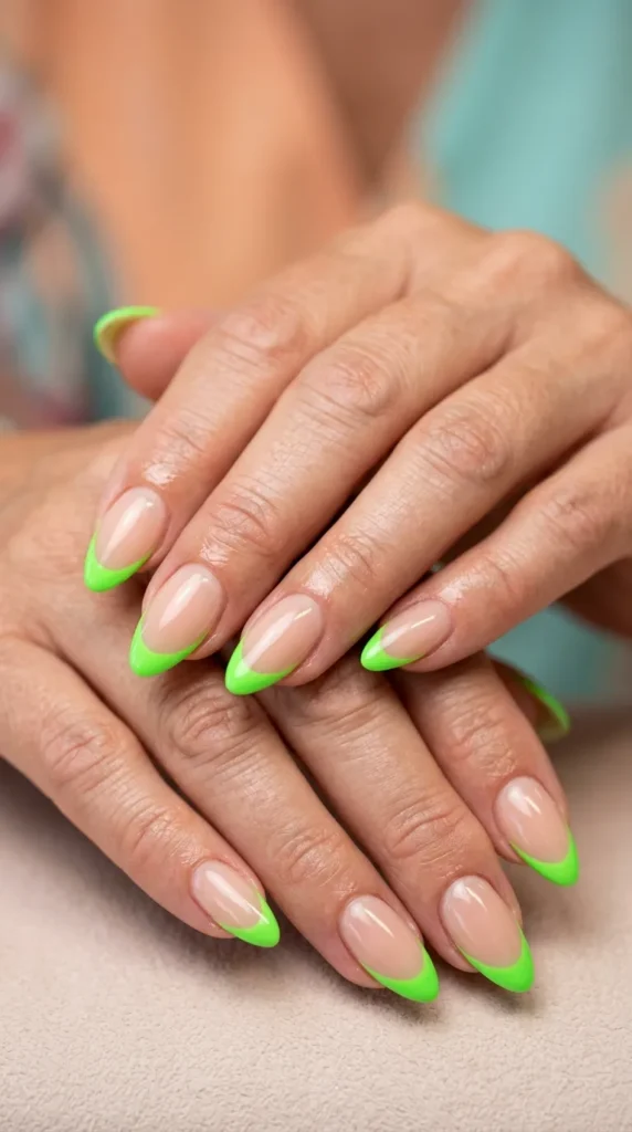 Neon green French tip almond nails