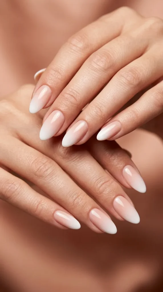 Ombre nude-to-white almond nails