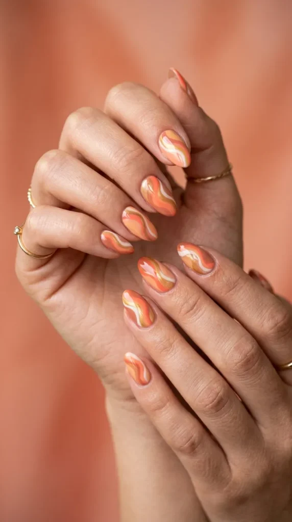 Peach coral swirl abstract nails