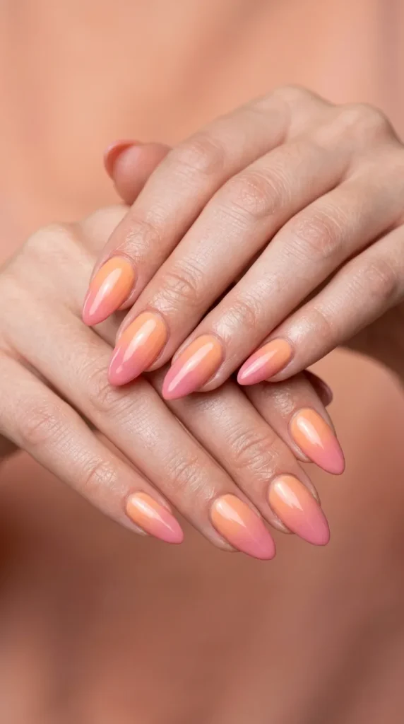 Peach to rose pink glossy almond nails