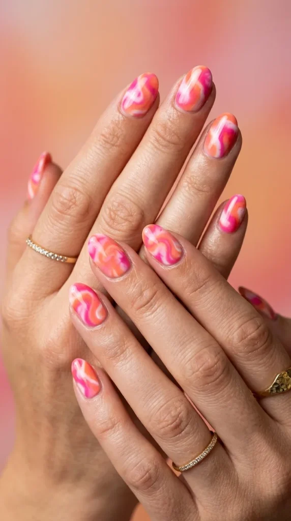pinkorange tiedye nails