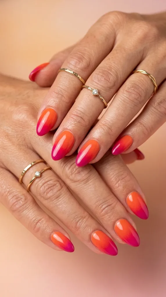 Sunset gradient almond nails (orange to pink blend)