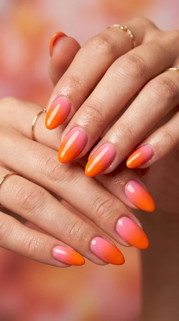 Sunset ombré orange pink nails