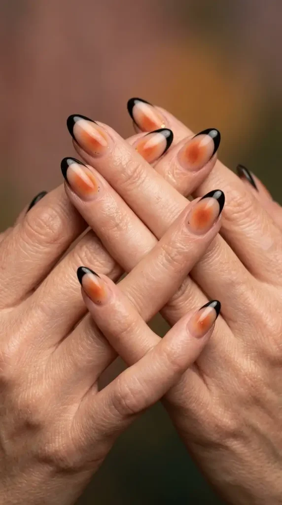 Black French Tips and Cinnamon Aura Nails