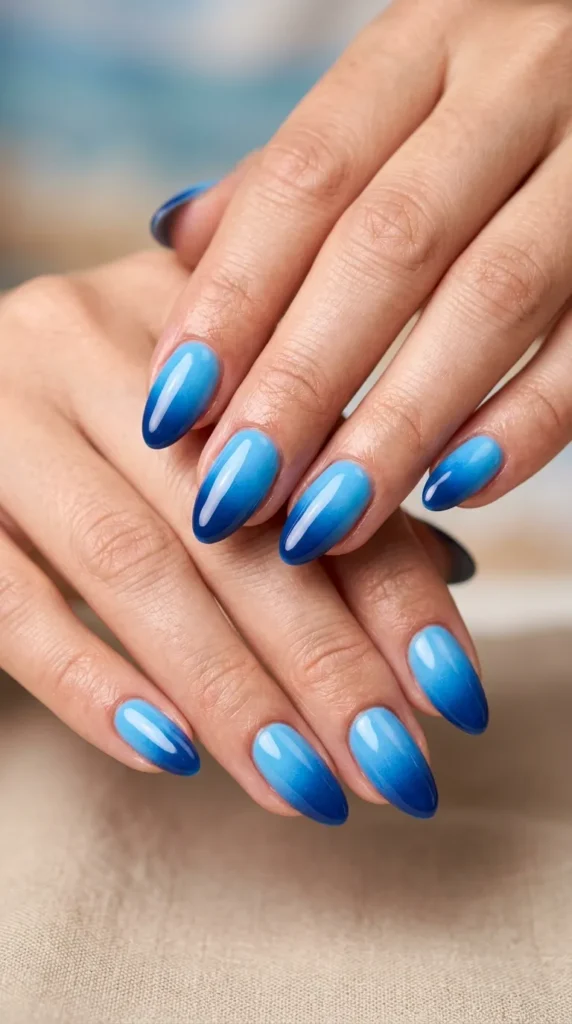 Blue ombré glossy manicure