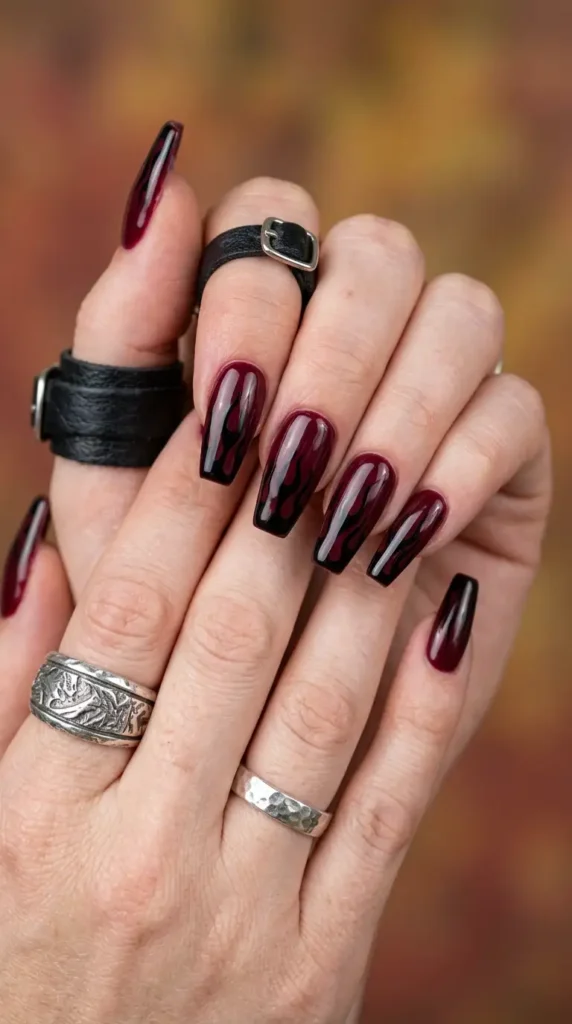 Burgundy and Black Flame Nail Design