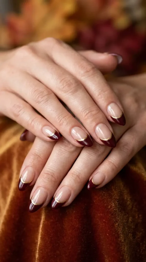 Burgundy French Tips with Gold Outline