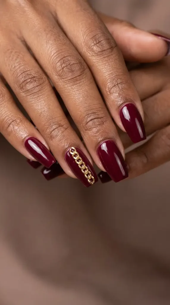 Burgundy Nails with Gold Chain Nail Charms