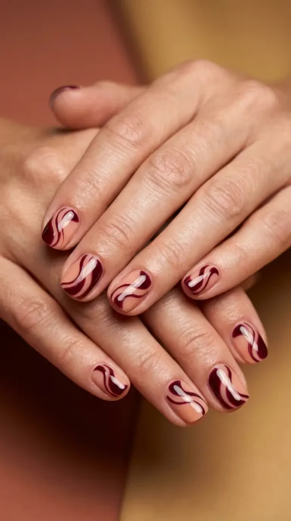 Burgundy & Nude Swirl Nail Art