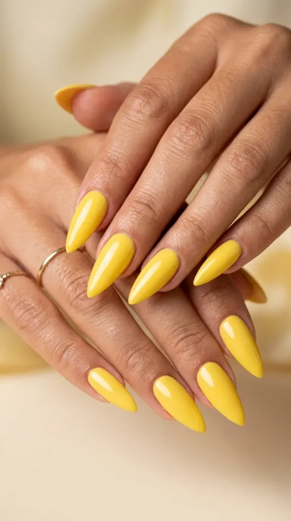Butter Yellow Glossy Stiletto Nails