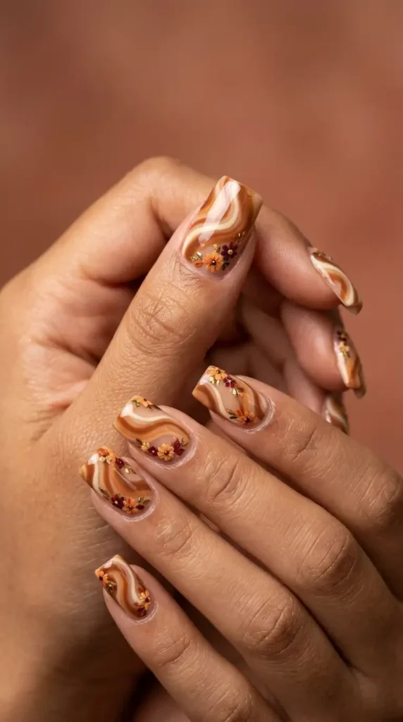 Caramel Swirl Nails with Floral Accents
