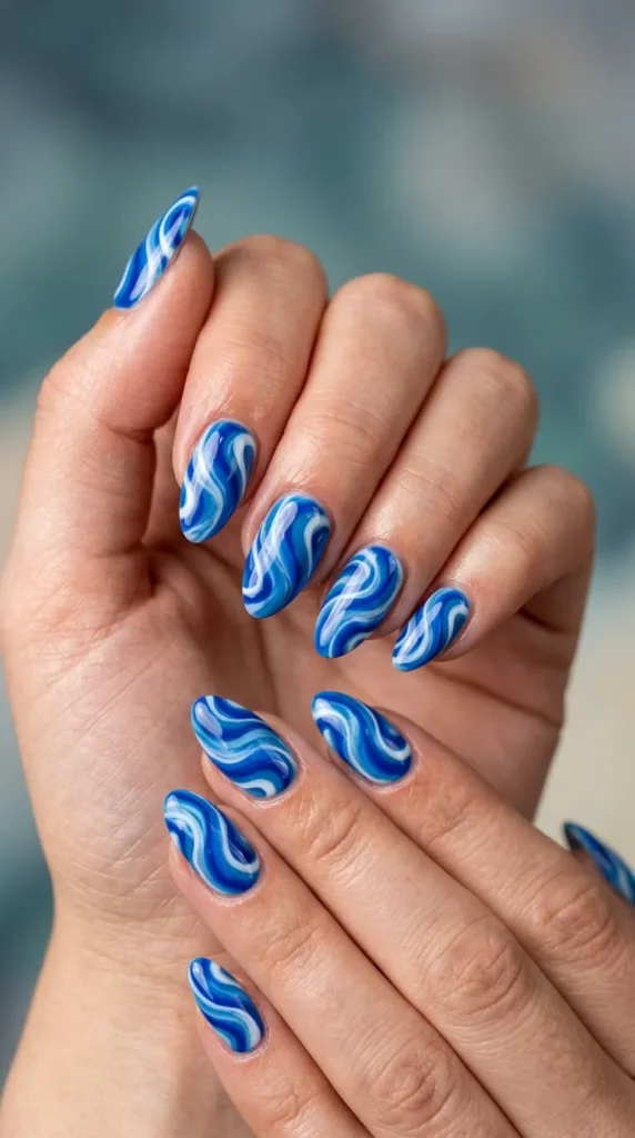Coastal swirl almond nails