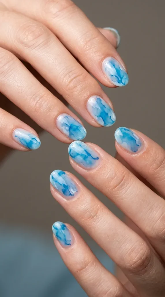 Coastal watercolor nail design