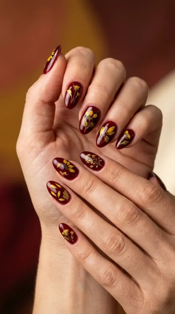 Dark Cherry Nails with Dried Flower Effect
