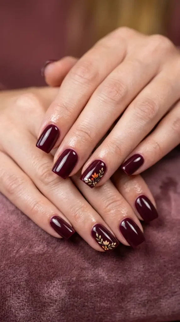 Deep Wine Nails with Minimal Floral Corners