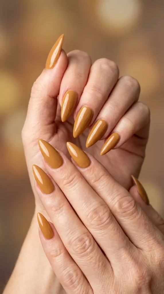 Glossy Peanut Butter Nude Stiletto Nails