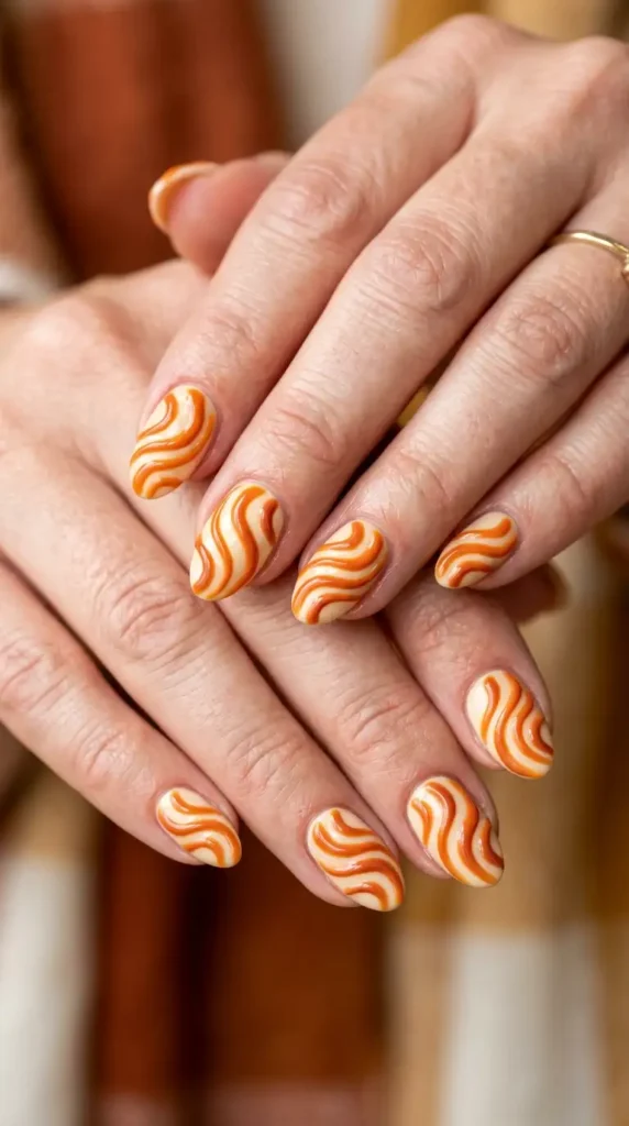 Pumpkin Spice Swirl Nails