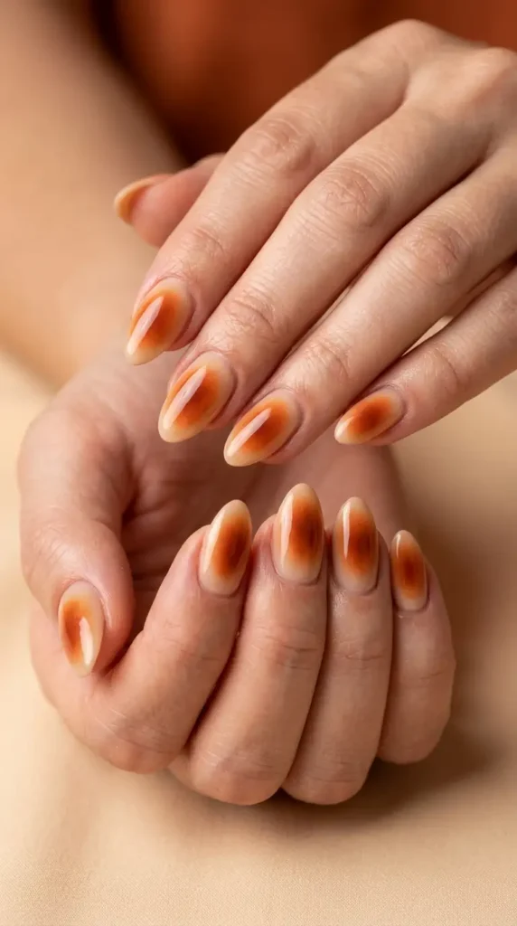 Rust Orange Aura Nails