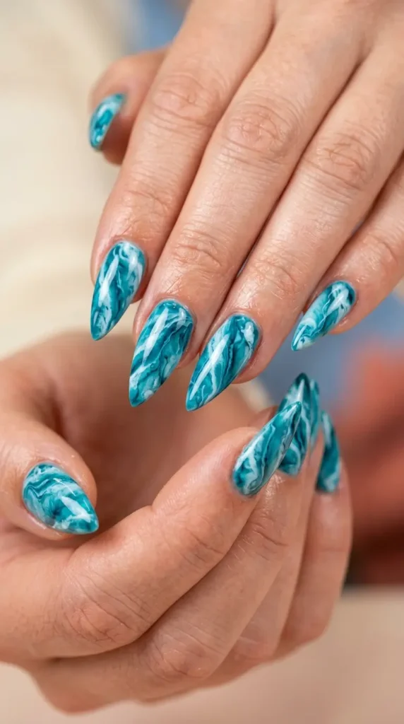 Teal Marble Stiletto Nails