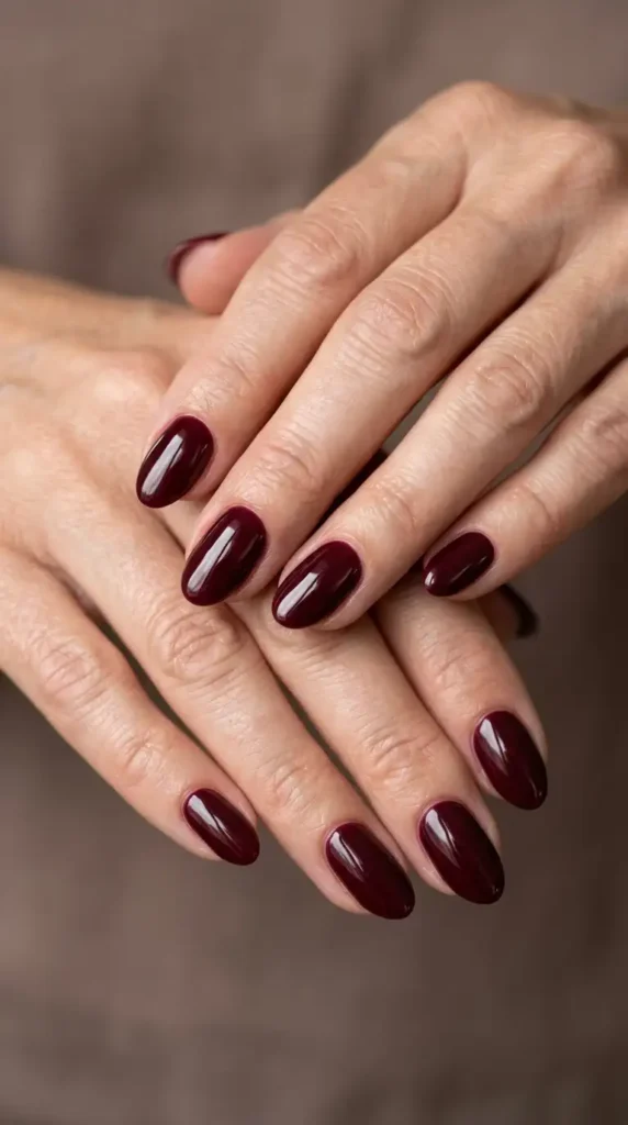 Burgundy Oval Nails with Glossy Finish