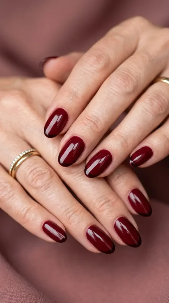 Deep Red Oval Nails with Micro-French Tips